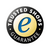 Rundes Trusted-Shops-Logo mit blauem Buchstaben "e" in der Mitte und weißer Schrift 'TRUSTED SHOPS GUARANTEE' auf schwarzem Rand
